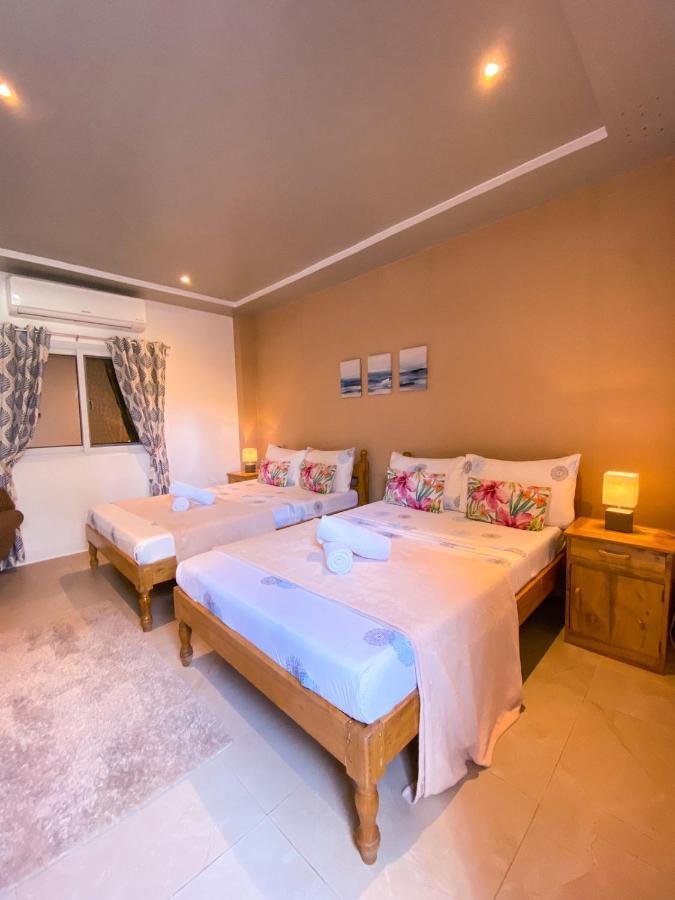 Bella'S Guest House Pooc Exterior photo